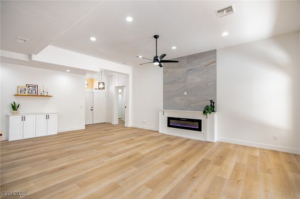 Empty room, Fireplace, Interior, Pendant Lights, Recessed Lighting, Wood Texture Flooring