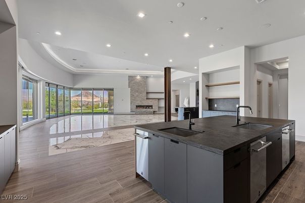Fireplace, Interior, Kitchen, Marble, Recessed Lighting, Stainless Steel Appliances, Wood Texture Flooring