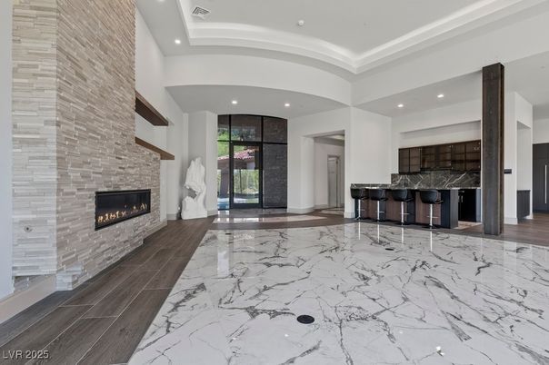 Fireplace, Interior, Marble, Recessed Lighting, Stone Walls