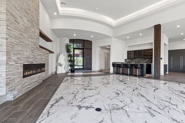 Fireplace, Interior, Marble, Recessed Lighting, Stone Walls