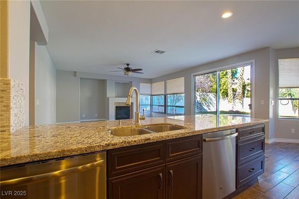 Fireplace, Interior, Kitchen, Recessed Lighting, Wood Texture Flooring
