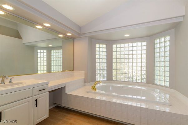 Bathroom, Dual Sink Vanities, Interior, Recessed Lighting, Wood Texture Flooring