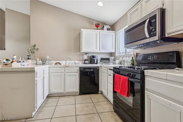Interior, Kitchen, Recessed Lighting, Tile Countertops