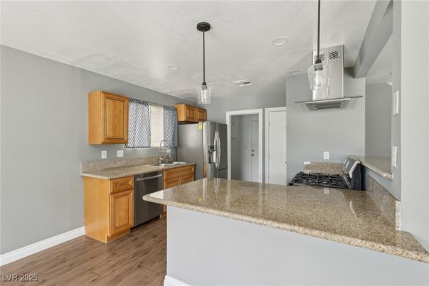Interior, Kitchen, Pendant Lights, Recessed Lighting, Stainless Steel Appliances, Wood Texture Flooring