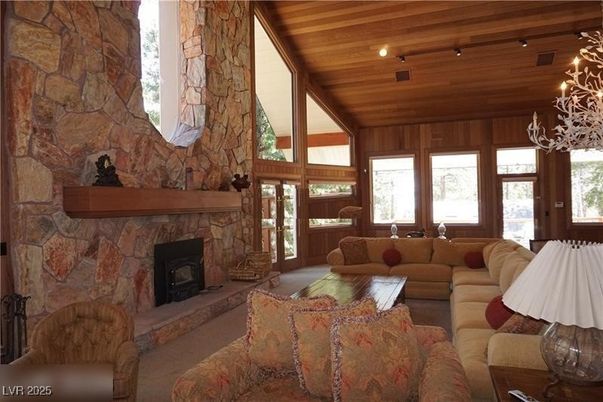 Chandelier, Fireplace, Interior, Living room, Stone Walls, Wooden Beams, Wooden Ceilings, Wooden Walls