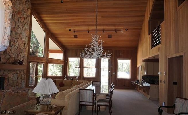 Chandelier, Dining room, Fireplace, Interior, Living room, Stone Walls, Wooden Beams, Wooden Ceilings, Wooden Walls