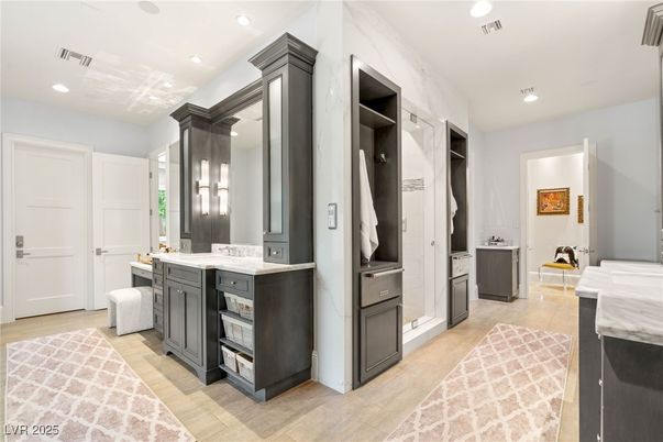 Bathroom, Dual Sink Vanities, Interior, Recessed Lighting, Wood Texture Flooring