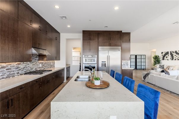 Dining room, Interior, Kitchen, Living room, Recessed Lighting, Stainless Steel Appliances, Wood Texture Flooring