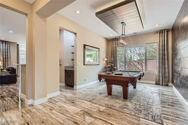 Billiard Table, Chandelier, Game Room, Interior, Pendant Lights, Recessed Lighting, Wood Texture Flooring