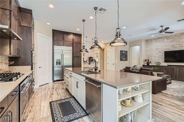 Interior, Kitchen, Pendant Lights, Recessed Lighting, Stainless Steel Appliances, Stone Walls, Wood Texture Flooring