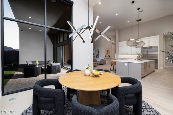 Dining room, Interior, Kitchen, Living room, Pendant Lights, Recessed Lighting, Stainless Steel Appliances, Wood Texture Flooring
