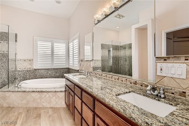 Bathroom, Dual Sink Vanities, Glass Shower, Interior, Recessed Lighting, Wood Texture Flooring