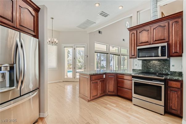 Chandelier, Interior, Kitchen, Recessed Lighting, Stainless Steel Appliances, Wood Texture Flooring