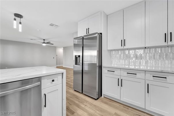 Interior, Kitchen, Recessed Lighting, Stainless Steel Appliances, Wood Texture Flooring