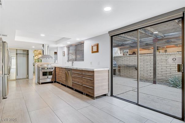 Interior, Kitchen, Recessed Lighting, Stainless Steel Appliances, Stone Walls