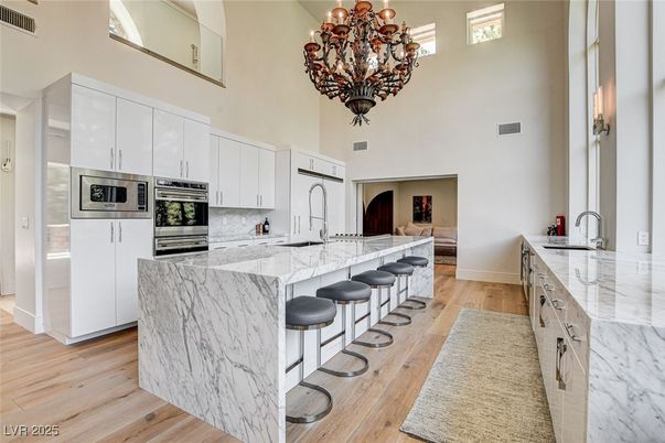 Chandelier, Interior, Kitchen, Marble Walls, Stainless Steel Appliances, Wood Texture Flooring