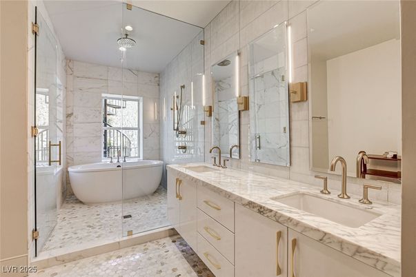 Bathroom, Dual Sink Vanities, Free Standing Baths, Glass Shower, Interior, Marble Walls, Recessed Lighting