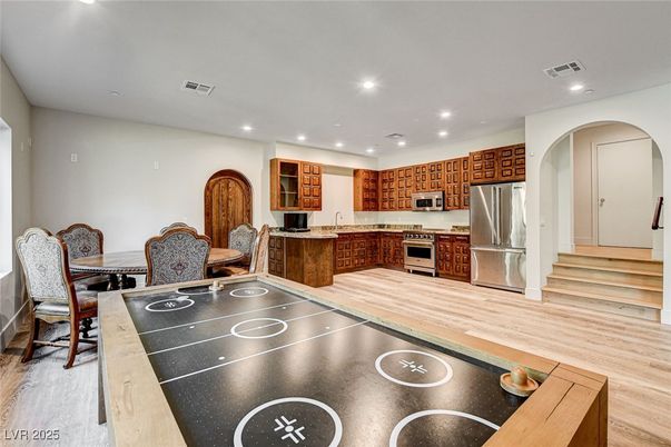 Dining room, Interior, Kitchen, Recessed Lighting, Stainless Steel Appliances, Wood Texture Flooring