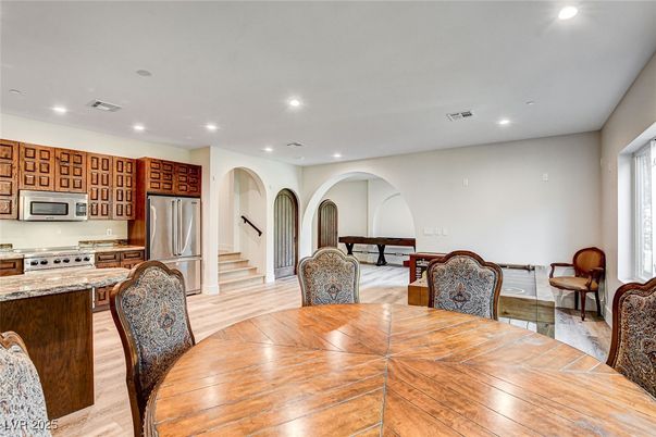 Dining room, Interior, Kitchen, Recessed Lighting, Stainless Steel Appliances, Wood Texture Flooring