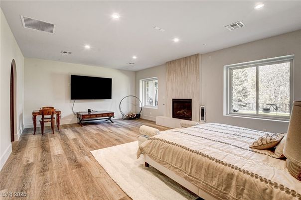 Bedroom, Fireplace, Interior, Recessed Lighting, Wood Texture Flooring