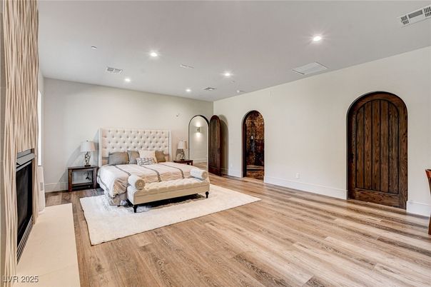 Bedroom, Fireplace, Interior, Recessed Lighting, Wood Texture Flooring