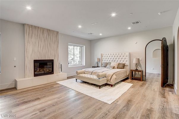 Bedroom, Fireplace, Interior, Recessed Lighting, Wood Texture Flooring