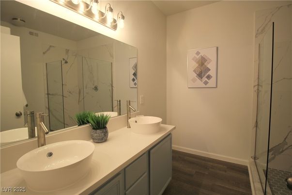 Bathroom, Dual Sink Vanities, Interior, Marble Walls, Wood Texture Flooring