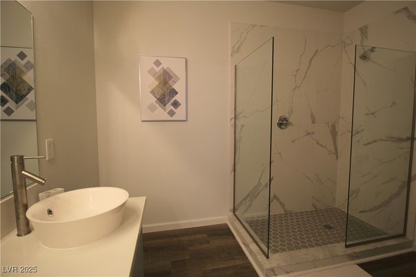 Bathroom, Glass Shower, Interior, Marble Walls, Wood Texture Flooring