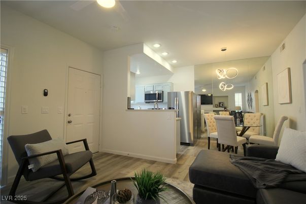 Dining room, Interior, Kitchen, Pendant Lights, Recessed Lighting, Stainless Steel Appliances, Wood Texture Flooring