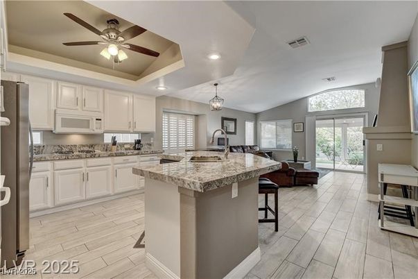 Chandelier, Interior, Kitchen, Pendant Lights, Recessed Lighting, Stainless Steel Appliances, Wood Texture Flooring