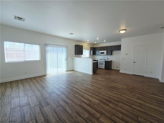 Empty room, Interior, Kitchen, Stainless Steel Appliances, Wood Texture Flooring