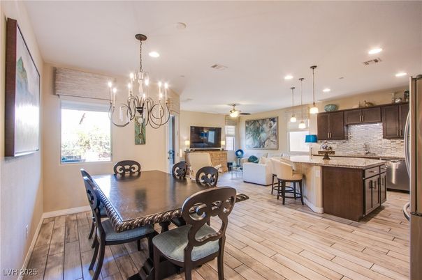 Chandelier, Dining room, Interior, Kitchen, Living room, Pendant Lights, Recessed Lighting, Wood Texture Flooring