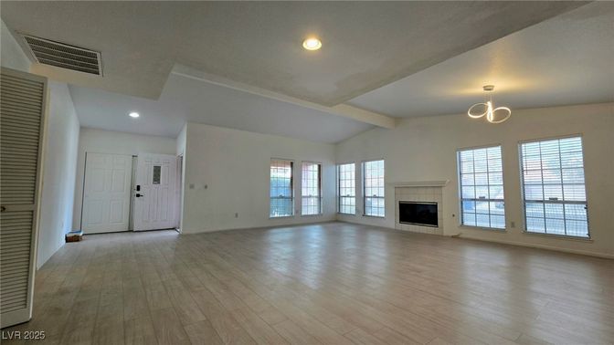 Empty room, Fireplace, Interior, Pendant Lights, Recessed Lighting, Wood Texture Flooring
