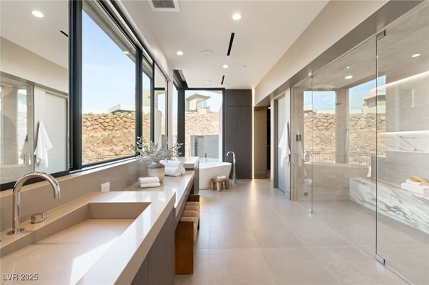 Bathroom, Dual Sink Vanities, Free Standing Baths, Glass Shower, Interior, Marble Walls, Recessed Lighting