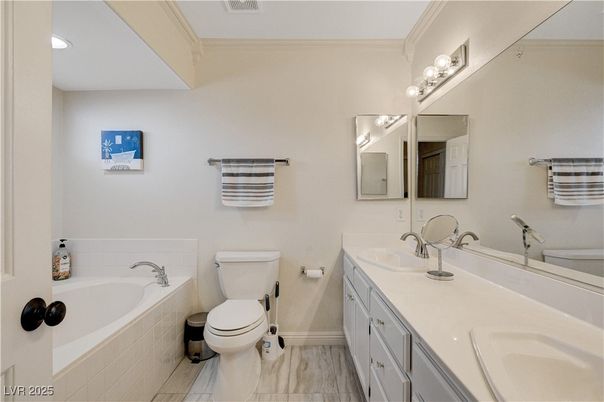 Bathroom, Dual Sink Vanities, Interior, Recessed Lighting, Wood Texture Flooring