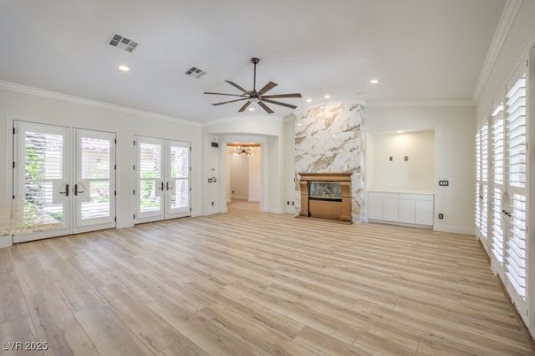 Empty room, Fireplace, Interior, Marble Walls, Recessed Lighting, Wood Texture Flooring