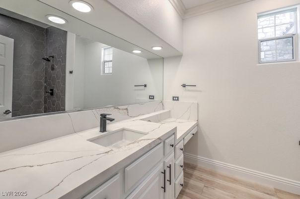 Bathroom, Dual Sink Vanities, Interior, Recessed Lighting, Wood Texture Flooring