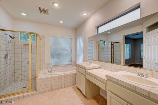 Bathroom, Dual Sink Vanities, Glass Shower, Interior, Recessed Lighting, Tile Countertops