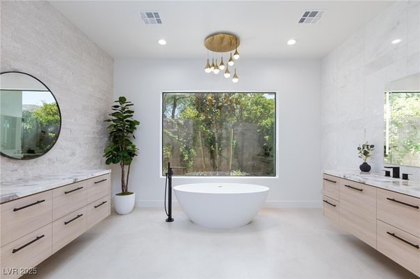 Bathroom, Dual Sink Vanities, Free Standing Baths, Interior, Marble Walls, Pendant Lights, Recessed Lighting