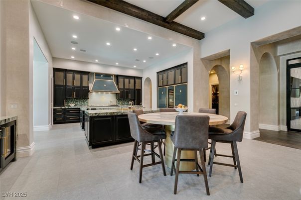 Dining room, Fireplace, Interior, Kitchen, Recessed Lighting, Stainless Steel Appliances, Wooden Beams