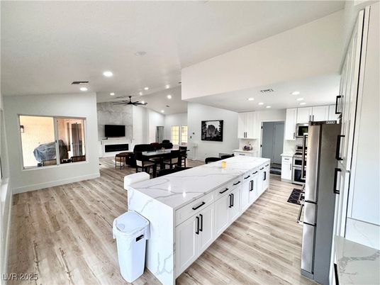 Dining room, Interior, Kitchen, Recessed Lighting, Stainless Steel Appliances, Wood Texture Flooring