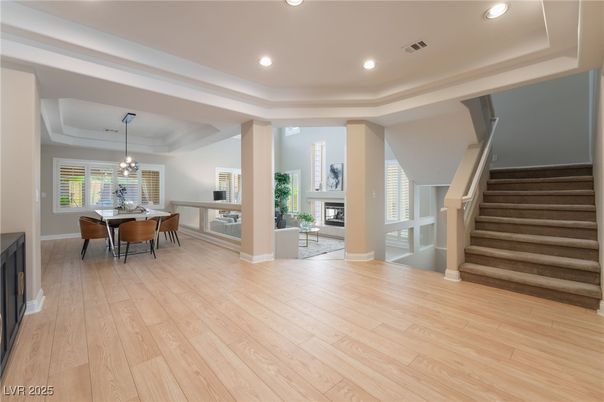 Chandelier, Dining room, Fireplace, Interior, Recessed Lighting, Wood Texture Flooring