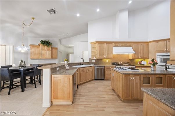 Dining room, Interior, Kitchen, Pendant Lights, Recessed Lighting, Stainless Steel Appliances, Wood Texture Flooring
