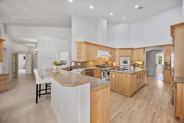 Dining room, Interior, Kitchen, Recessed Lighting, Stainless Steel Appliances, Wood Texture Flooring