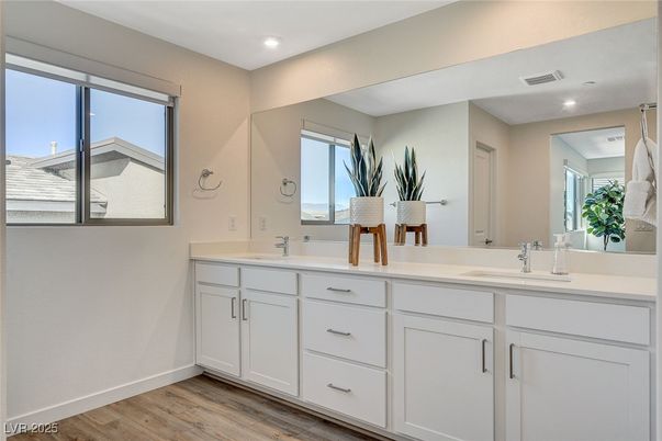 Bathroom, Dual Sink Vanities, Interior, Recessed Lighting, Wood Texture Flooring