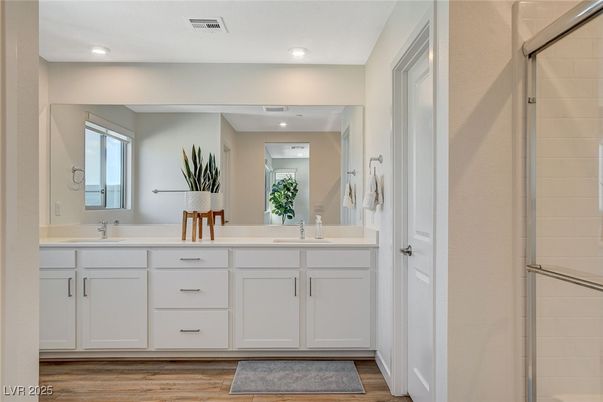 Bathroom, Dual Sink Vanities, Interior, Recessed Lighting, Wood Texture Flooring