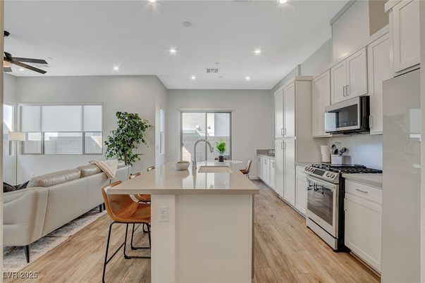 Dining room, Interior, Kitchen, Living room, Recessed Lighting, Stainless Steel Appliances, Wood Texture Flooring