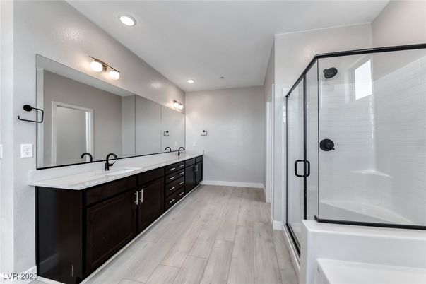 Bathroom, Dual Sink Vanities, Glass Shower, Interior, Recessed Lighting, Wood Texture Flooring