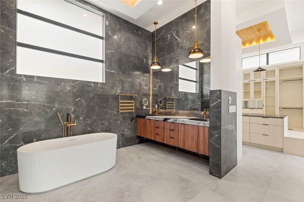 Bathroom, Dual Sink Vanities, Free Standing Baths, Interior, Marble Walls, Pendant Lights, Recessed Lighting