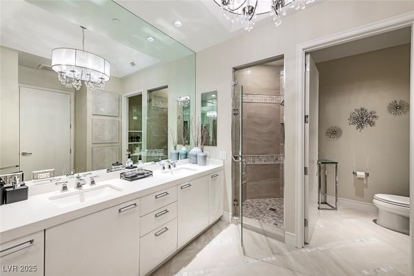 Bathroom, Chandelier, Dual Sink Vanities, Glass Shower, Interior, Recessed Lighting